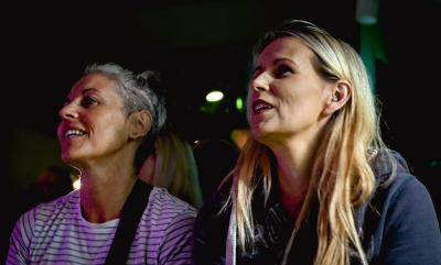 Two Ladies Watching An Event In The Phoenix Theatre