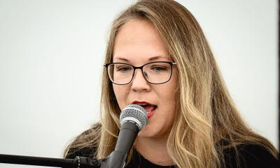 Lady Singing Into Microphone