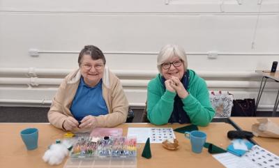 Two Handmaiden Craft Group Members