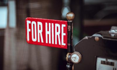 Image of a sign that says "For Hire"