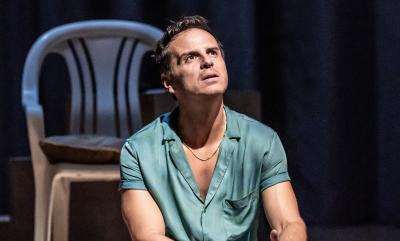 Andrew Scott In Vanya sat on the floor in front of a chair