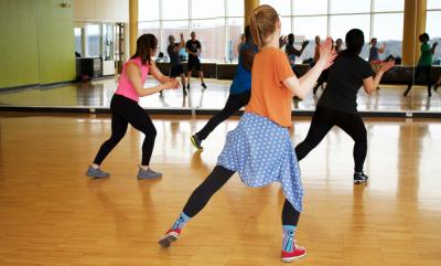 People moving in an exercise class
