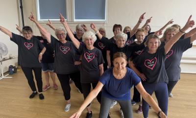 Ladies holding a pointing dance pose