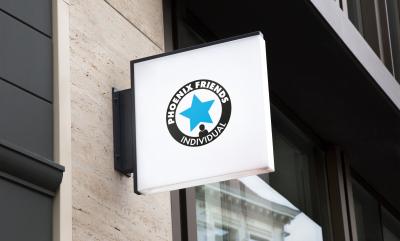 Phoenix Friend individual membership advertised on a street sign.