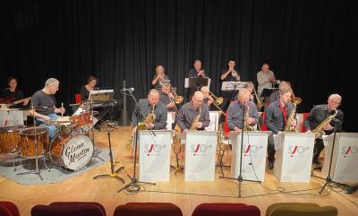 A jazz orchestra performing live
