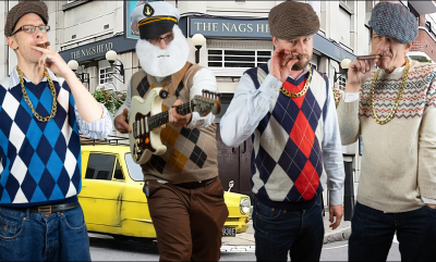 Four men dressed as characters from Only Fools and Horses
