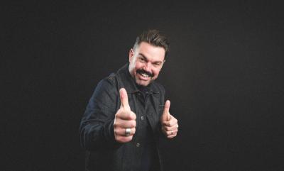 A man doing two thumbs up