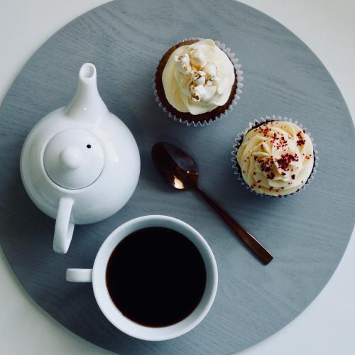 Timebank Afternoon Tea with two cupcakes