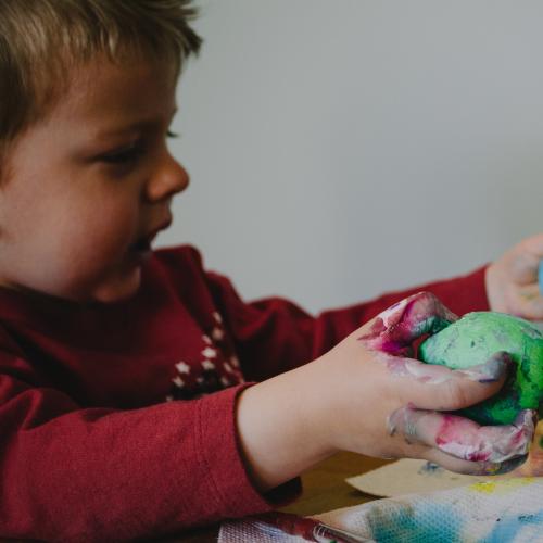 A child doing Arts & Craft