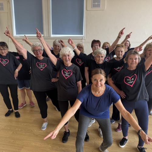 Ladies holding a pointing dance pose